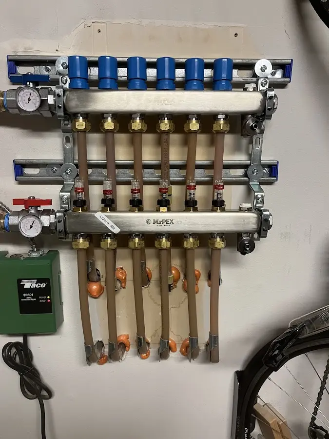 Plumber performing Water Heater Repair at a residential property in Potterville